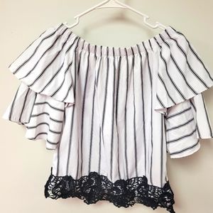 Off the sholder white and black top